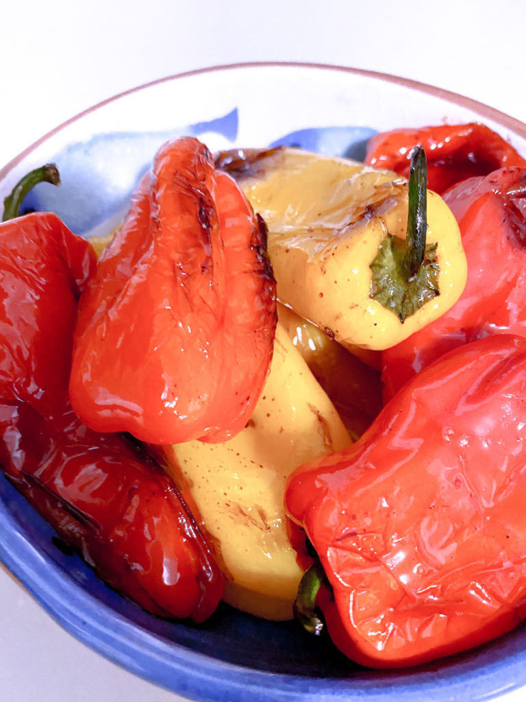 Blistered sweet mini peppers ready to be served.