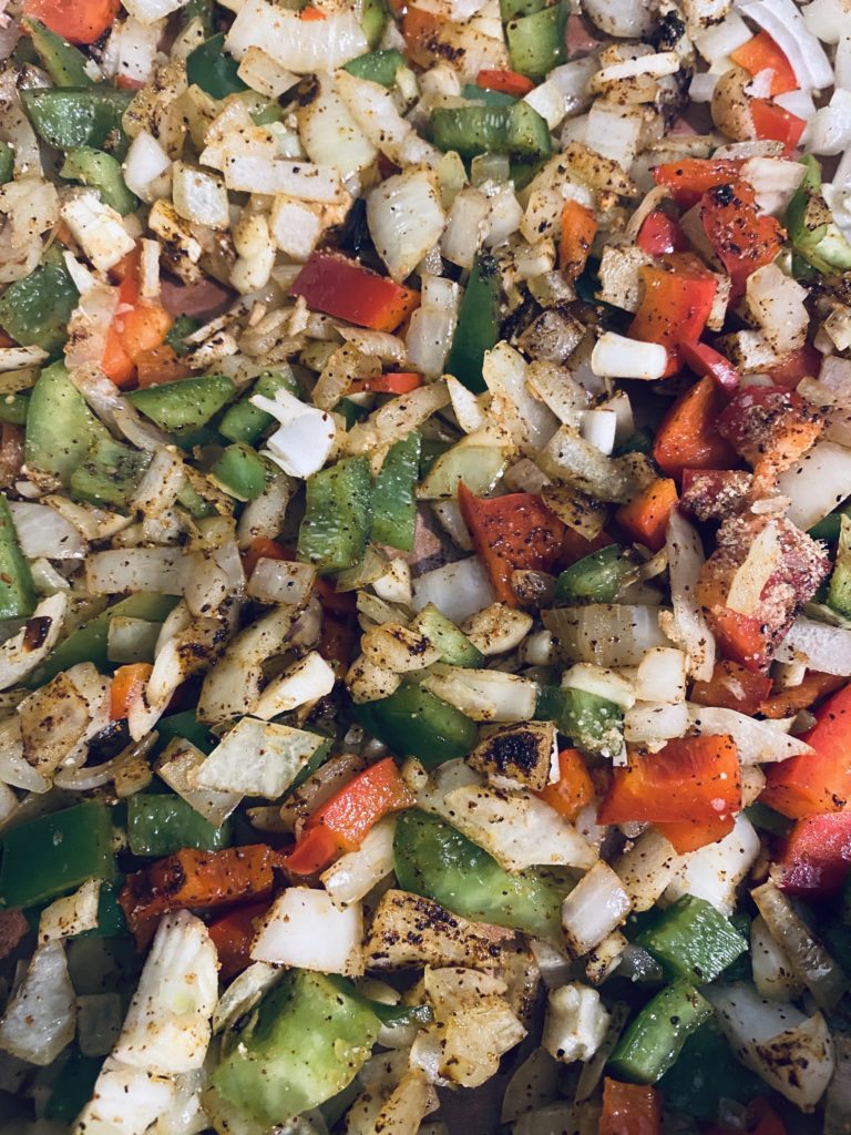 Vegetables cooking for black beans.