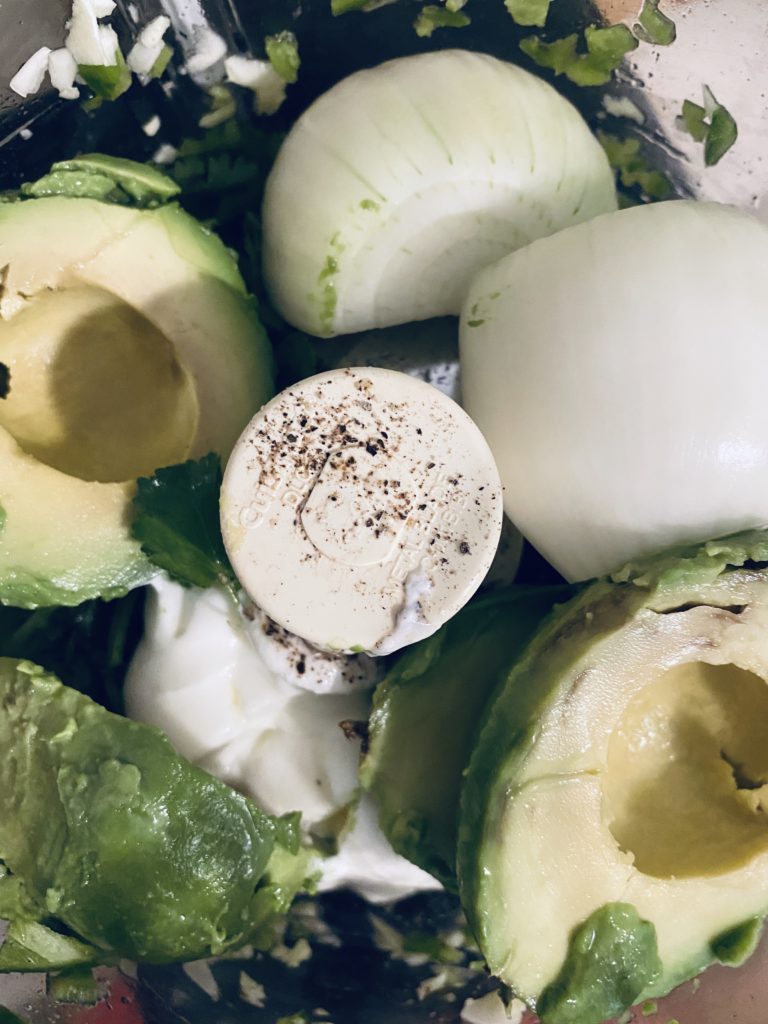 Ingredients for Creamy Avocado Dip in the food processor.