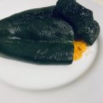 Stuffed poblano peppers ready to be enjoyed.