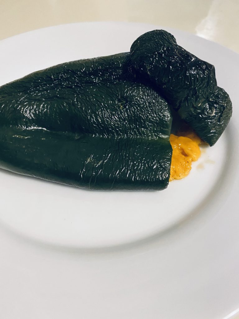 Stuffed poblano peppers ready to be enjoyed. 