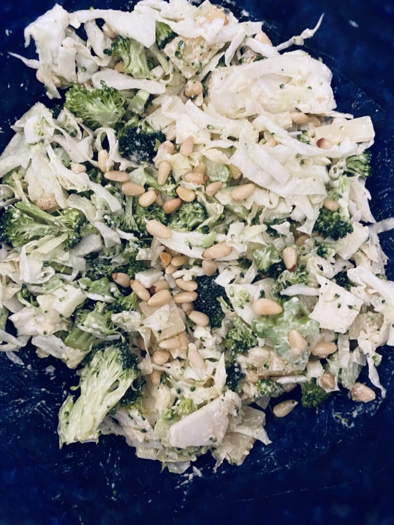 Broccoli Cabbage Caesar Salad ready to be served.