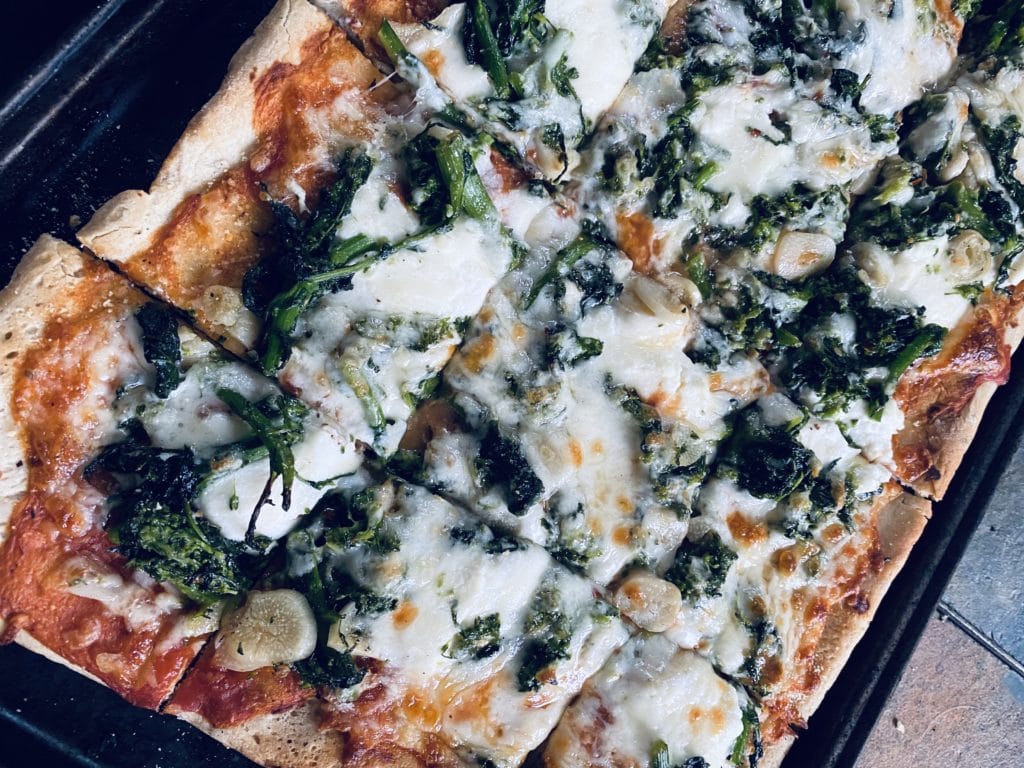 Broccoli rabe pizza made with food processor pizza dough.