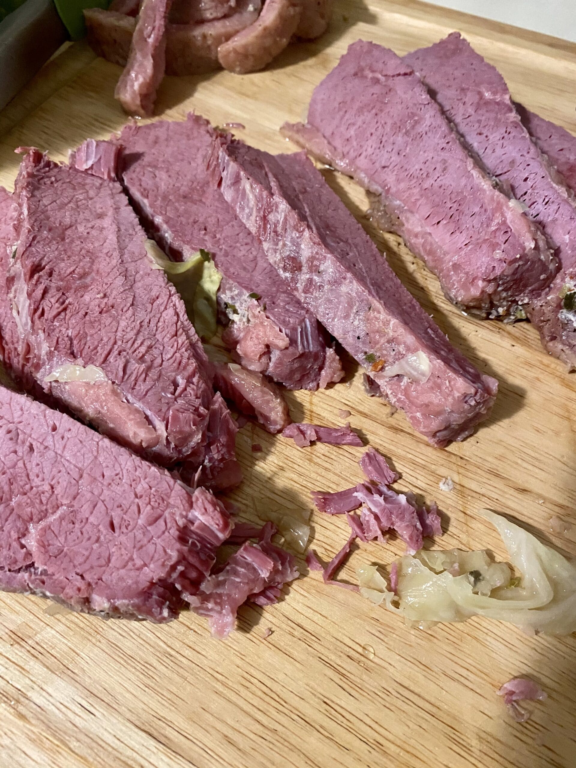 slow cooked corned beef sliced and ready to serve.
